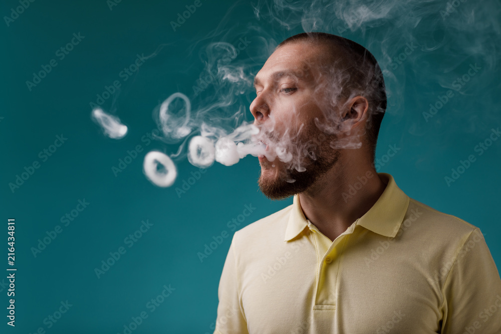 vaping man launches ring of smoke vaping man launches ring of smoke