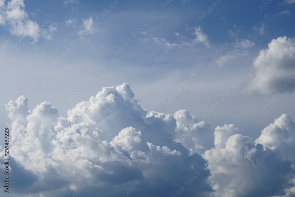Amazing cumulus clouds with sunlight on the background of clear blue sky, Summer in GA USA.