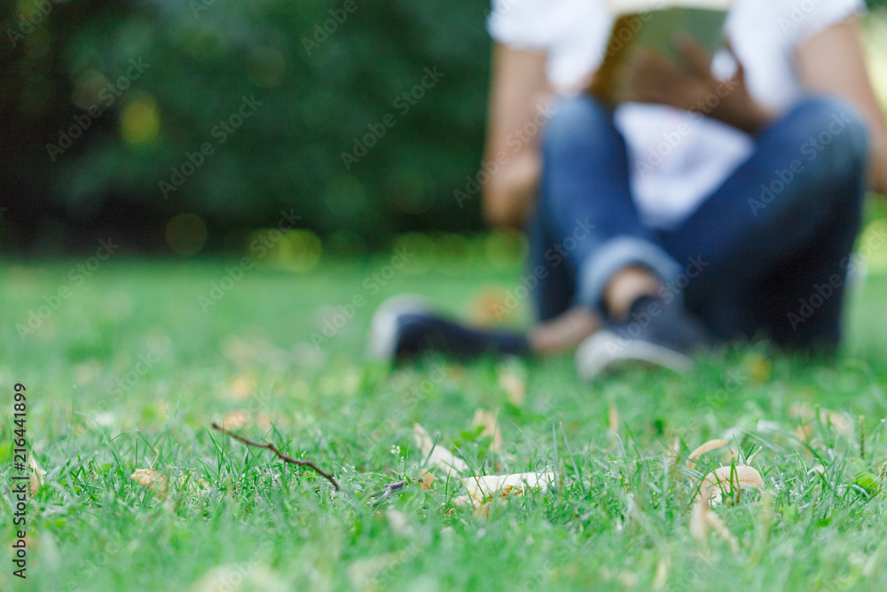 Fototapeta premium The concept of a middle-aged woman relaxing in nature