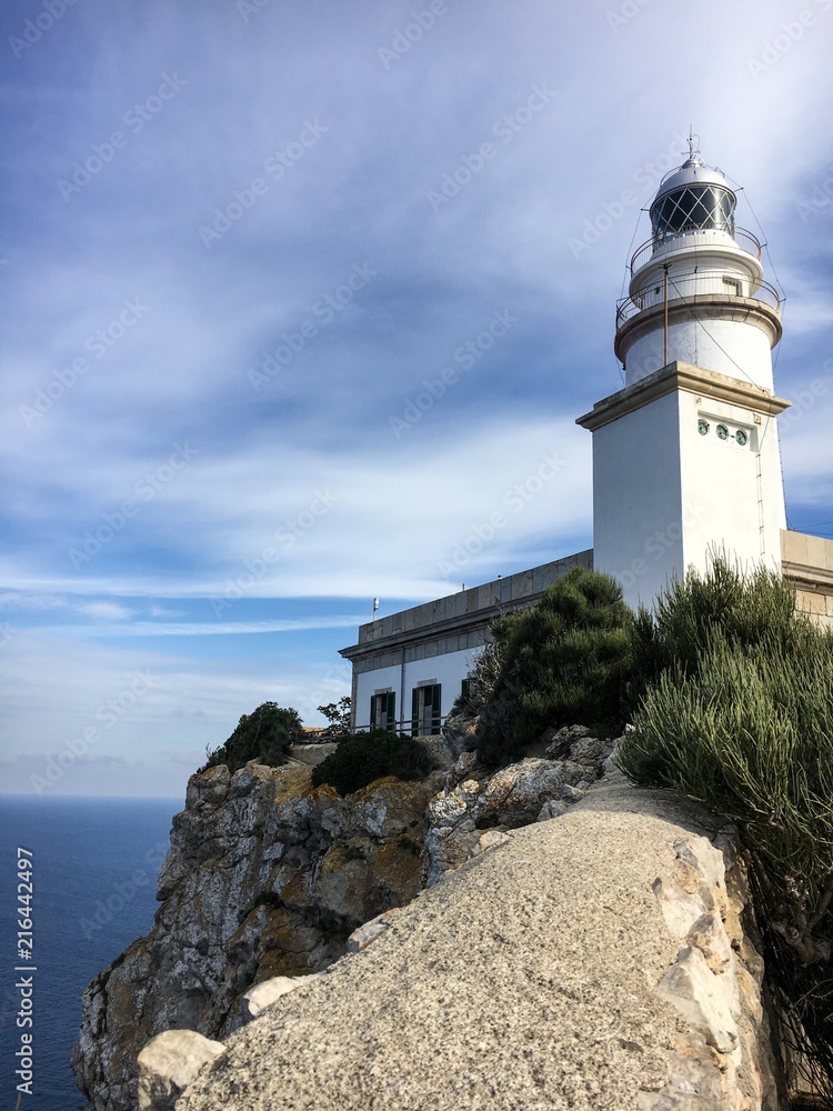 View of the lighthouse on top of a mountain, Coast of the Mallorca island, Spain.