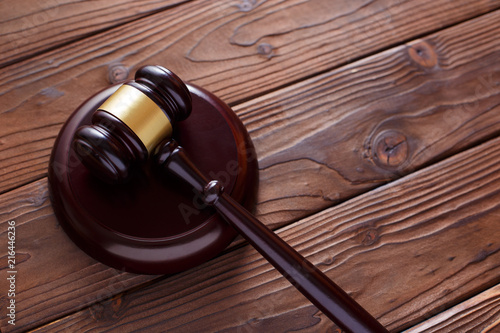 Wooden hammer on the wooden table