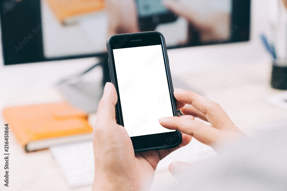 Man hands holding touching mobile smartphone isolated white screen for mockup design Man hands holding touching mobile smartphone isolated white screen for mockup design