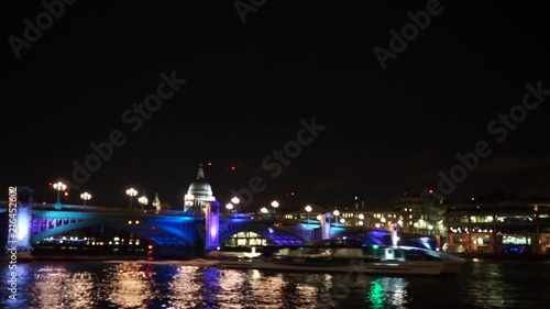 Thames with London Bridge and night lights photo