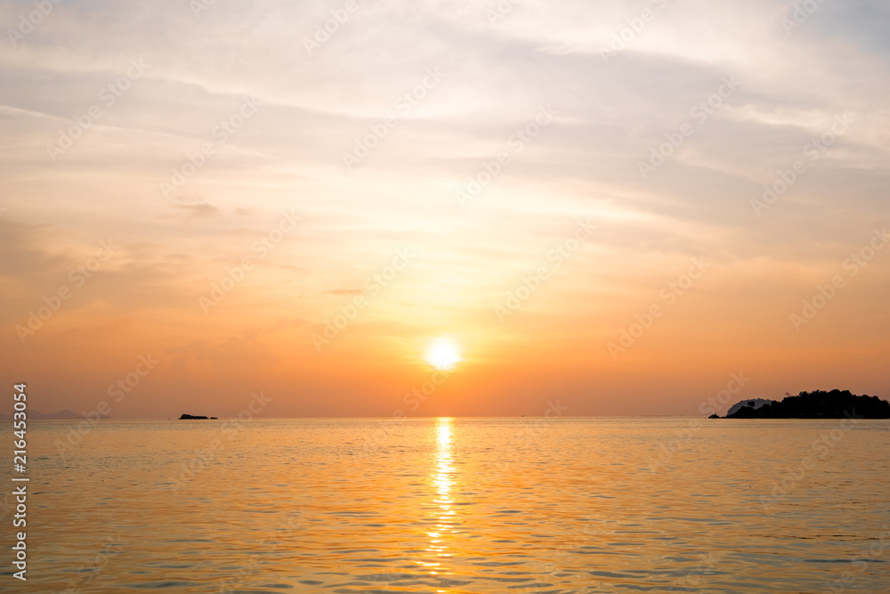 Beautiful of sunrise with colorful sky in summer time concept travel, holiday and vacation. Tropical paradise beach nature landscape at Lipe island in Thailand.