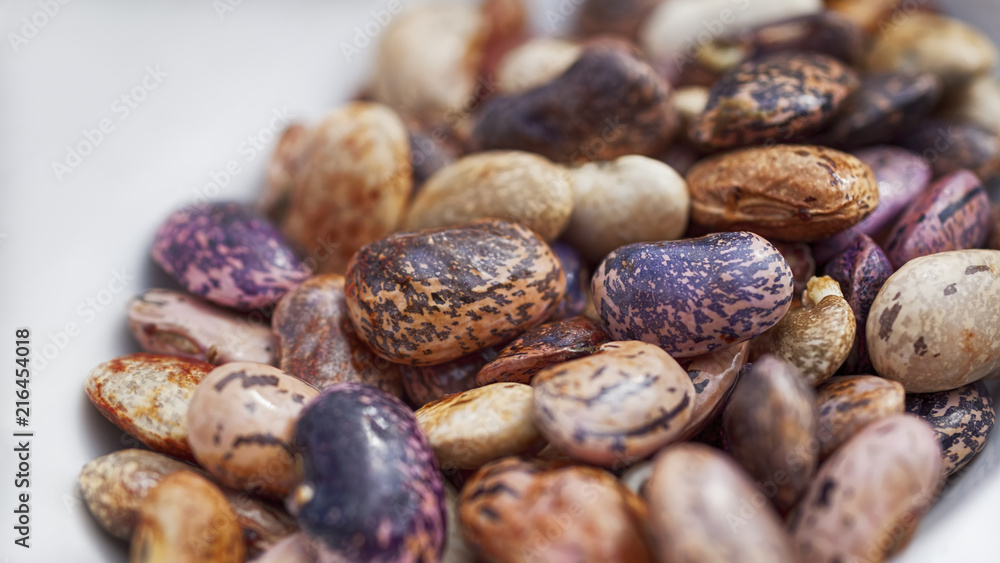 A closeup of dry colorful pinto beans A closeup of dry colorful pinto beans