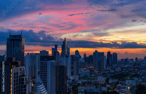 urban cityscape with sunrise sky and cloudscape