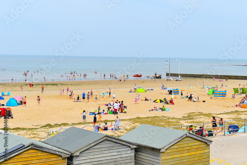 Beachgoers making the most of the sunshine at Minnis Bay over the weekend. Birchington, Kent, England