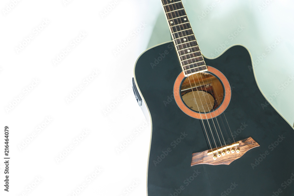 Fototapeta premium black guitar classic on white background.