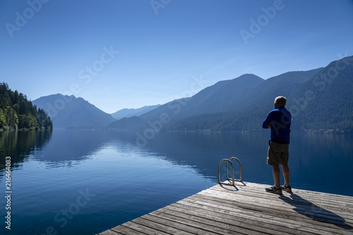 Man looking toward horizon.