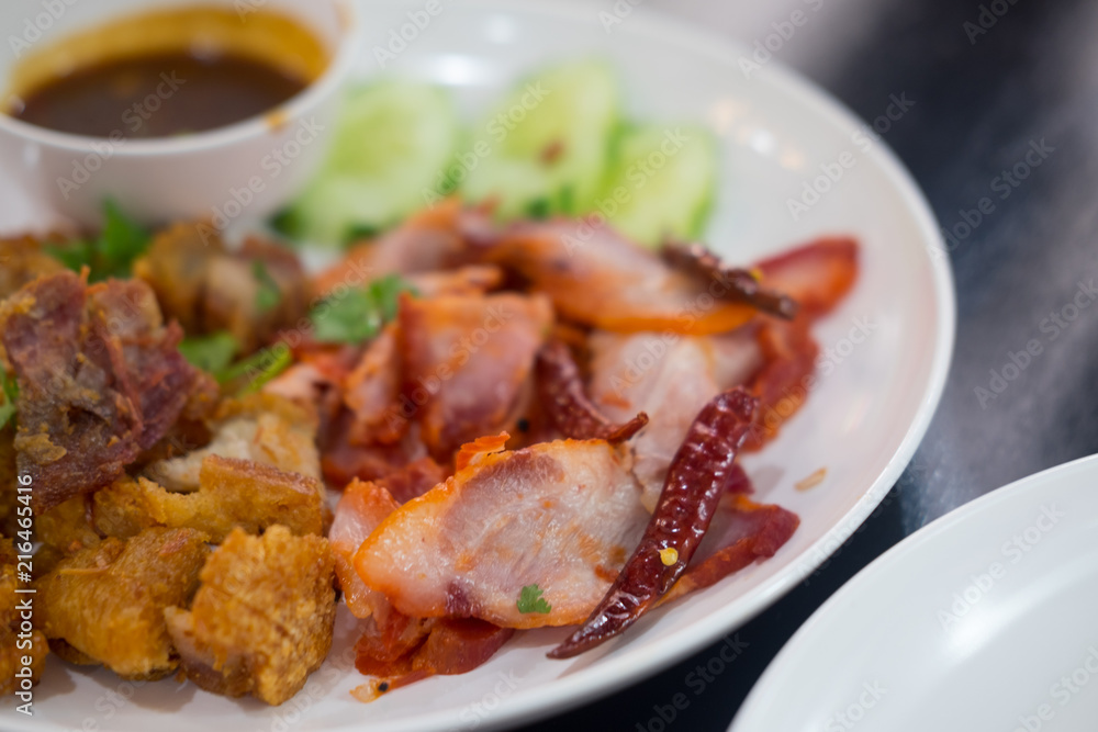 Crispy pork and grilled red pork, Thai food Crispy pork and grilled red pork, Thai food