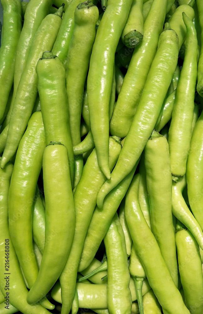 Fresh Large Chili And Chili Spur Pepper, Young Chili, (Prik Num Chili) texture background. Fresh Large Chili And Chili Spur Pepper, Young Chili, (Prik Num Chili) texture background.