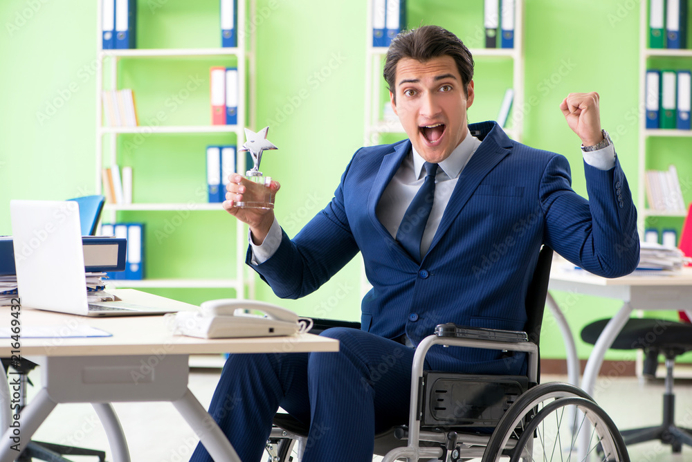 Disabled businessman working in the office Disabled businessman working in the office