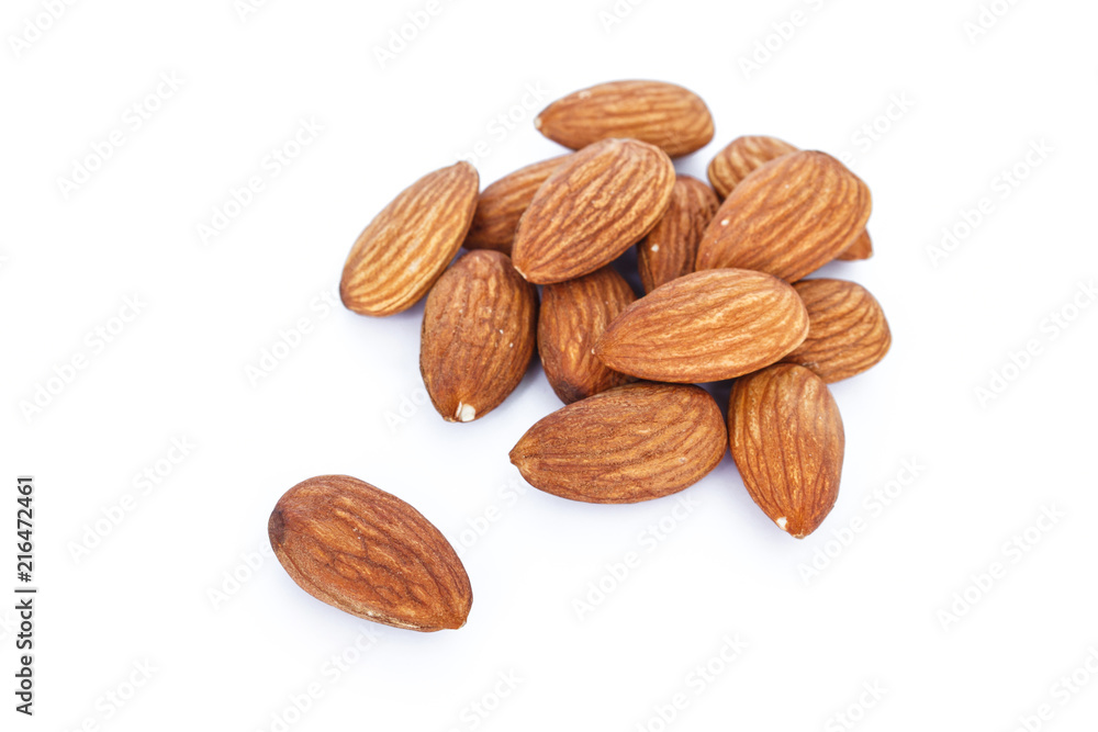 heap almonds on white background. heap almonds on white background.