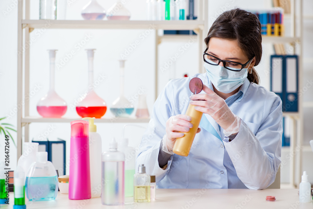 Lab chemist checking beauty and make-up products Lab chemist checking beauty and make-up products