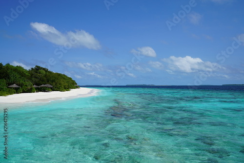 Fototapeta Naklejka Na Ścianę i Meble -  View of a beautiful beach with turquoise water in Baa Atoll, Maldives
