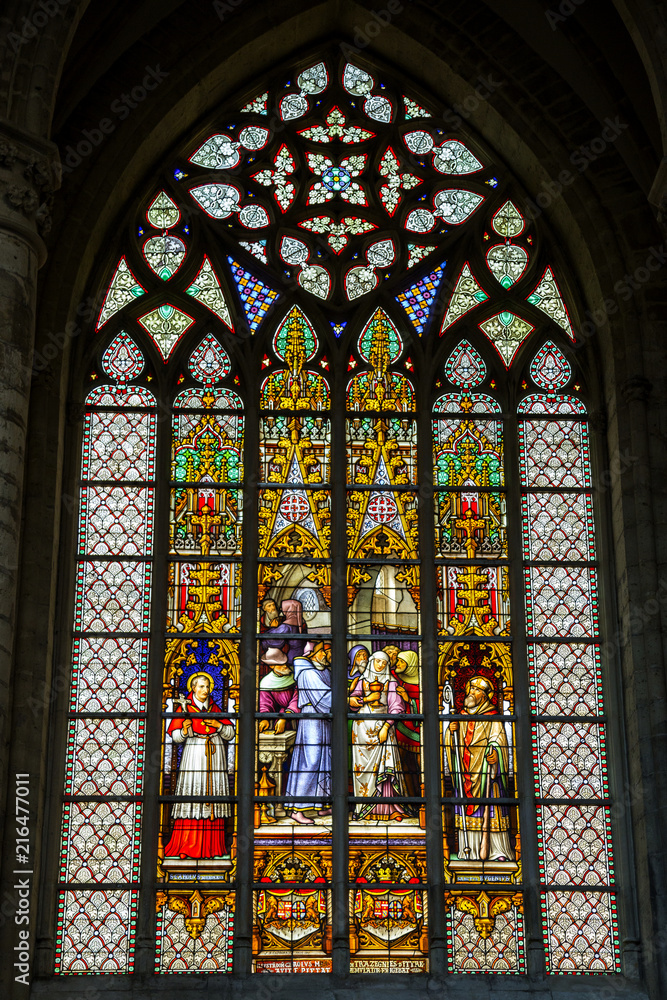 An ancient stained glass window in the Cathedral of St. Michael and St. Gudula