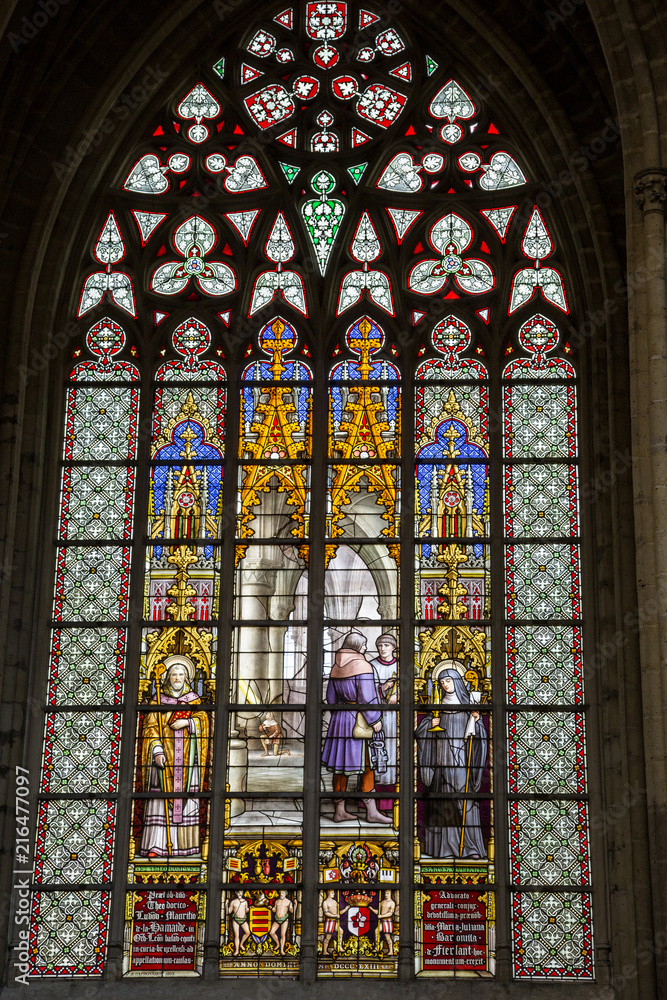 An ancient stained glass window in the Cathedral of St. Michael and St. Gudula