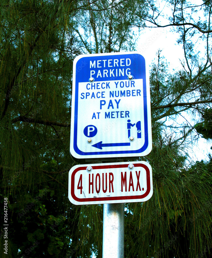 Pay Metered Parking Four Hour Max Sign