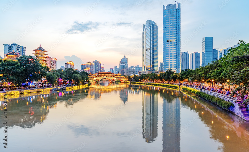 Fototapeta premium Nine hole bridge and skyscraper in chuengdu,china