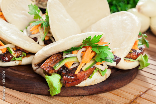 Gua bao, steamed buns with pork belly and vegetable photo