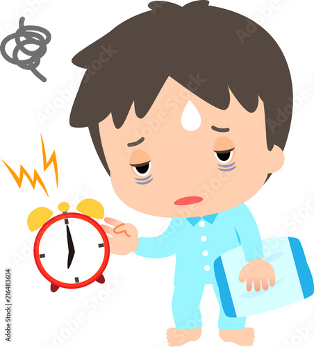 だるそうな様子で目覚まし時計を止める男性