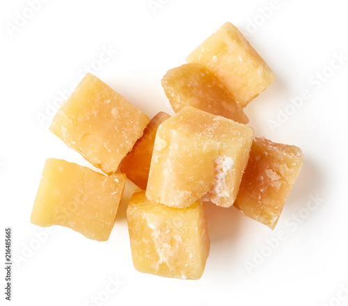Parmesan cheese cubes isolated on white, from above