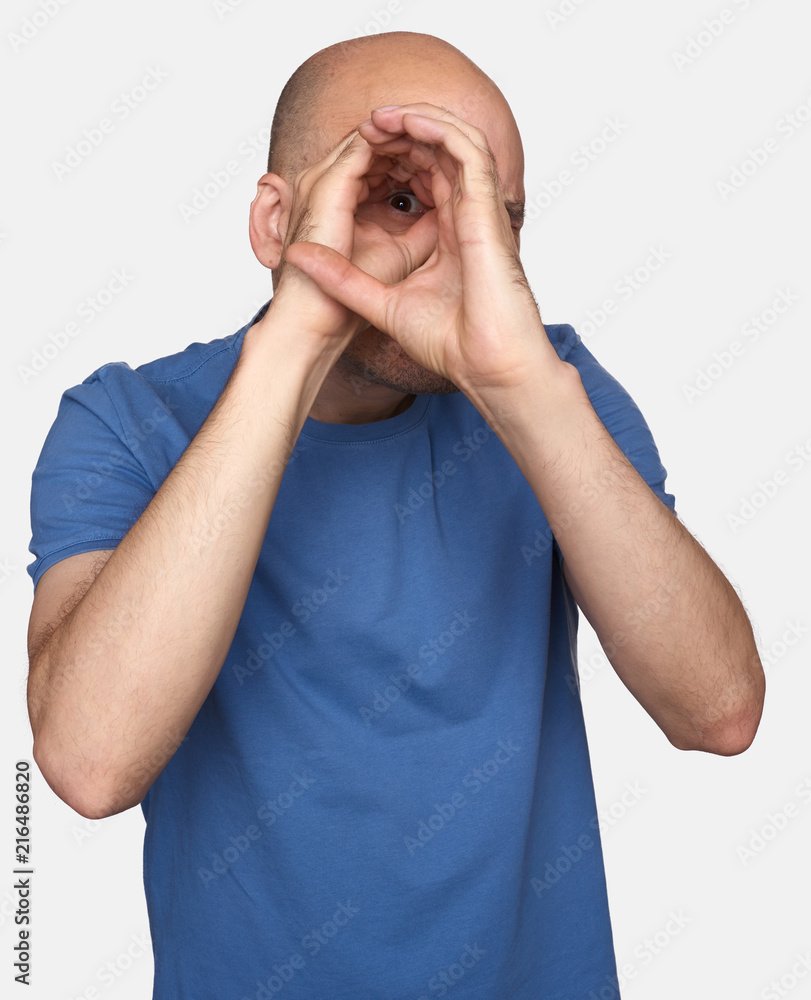 man making binocular or tube with his hands man making binocular or tube with his hands