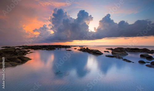 Beautiful clouds during sunset at Unknown Beach in Sabah  Malaysia. soft focus due to long expose.