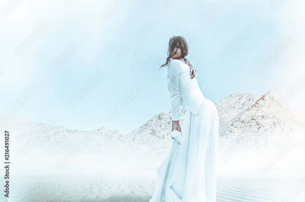 Girl outside posing in long beautiful white dress Girl outside posing in long beautiful white dress