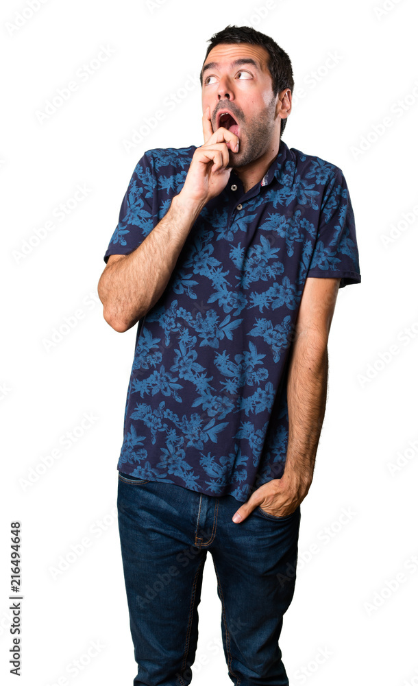 Brunette man making surprise gesture on white background Brunette man making surprise gesture on white background
