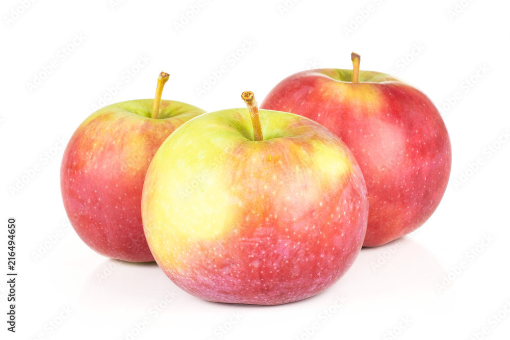 Group of three whole fresh red apple james grieve variety isolated on white background