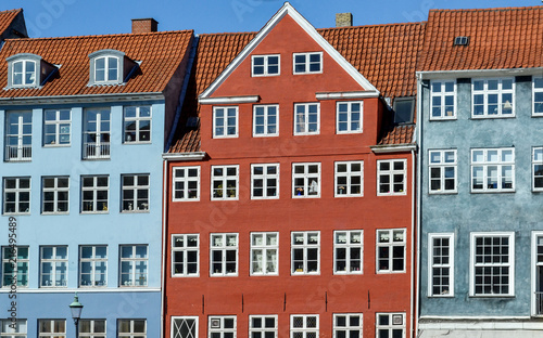 Facades of historic buildings in Copenhagen. Colorful houses