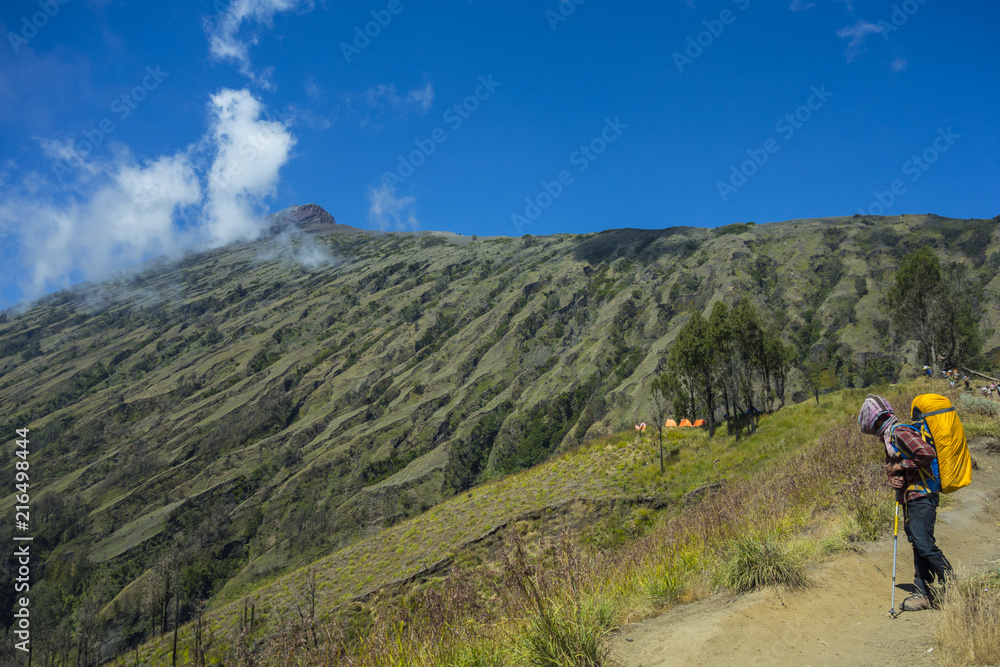 View of hikers on their way to the summit of mount Rinjani, Lombok, Indonesia.