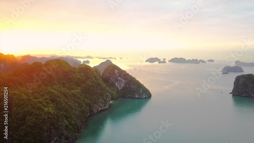Aerial moving in shot of sunrise view at HaLongBay, Vietnam. photo