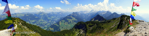 Panoramablick vom Hohen Frassen im Vorarlberg auf Bergkette im Bregenzerwald bei Sonnenschein  photo