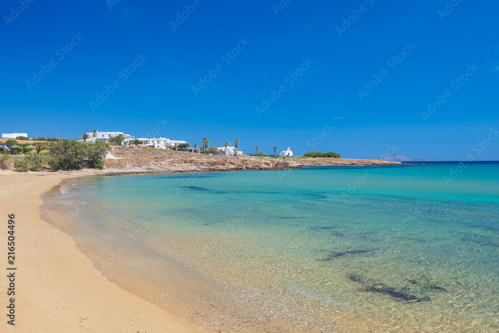 Sandy beach with amazing tranquil water on Paros island, Cyclades, Greece.