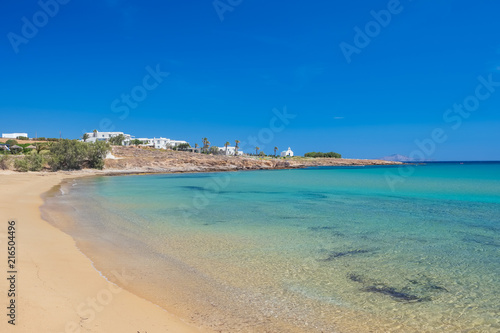 Sandy beach with amazing tranquil water on Paros island, Cyclades, Greece.