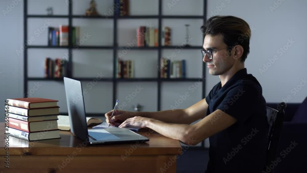Student of University, Writing Motivation Letter, Working in the Library, Using Laptop and Digital Device in Studying Student of University, Writing Motivation Letter, Working in the Library, Using Laptop and Digital Device in Studying
