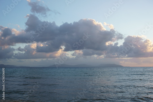 View of clouds over the sea at sunset time