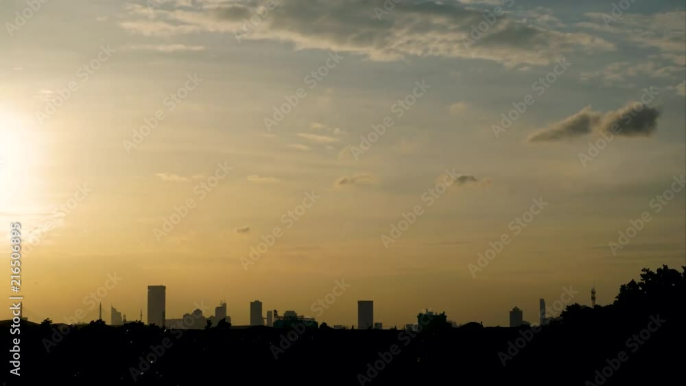 Time-lapse of Sunset with sillouhette cityscapes of Bangkok, Thailand Time-lapse of Sunset with sillouhette cityscapes of Bangkok, Thailand