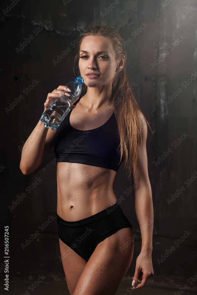 A sport girl drink water Stock Photo by ©Profstock 80727508