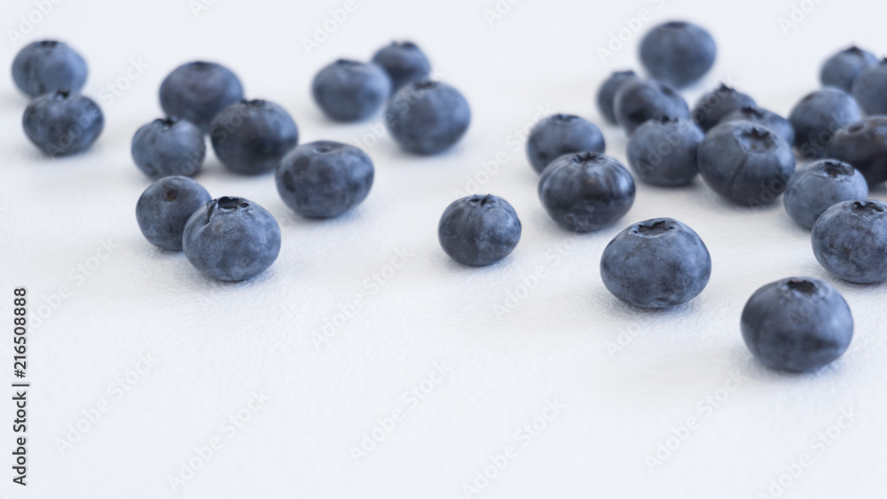 Blueberries and cranberries, berries on a white background. Berry light background. Blueberries and cranberries, berries on a white background. Berry light background.
