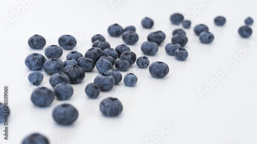 Blueberries and cranberries, berries on a white background. Berry light background.