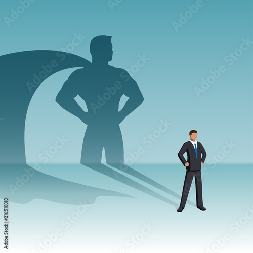 Businessman with superhero shadow