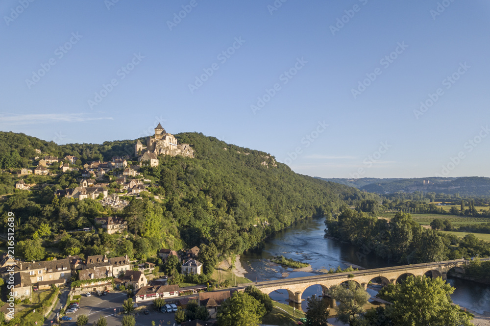 Aerial view of Castelnaud castle, historical bridge and Tournepique village