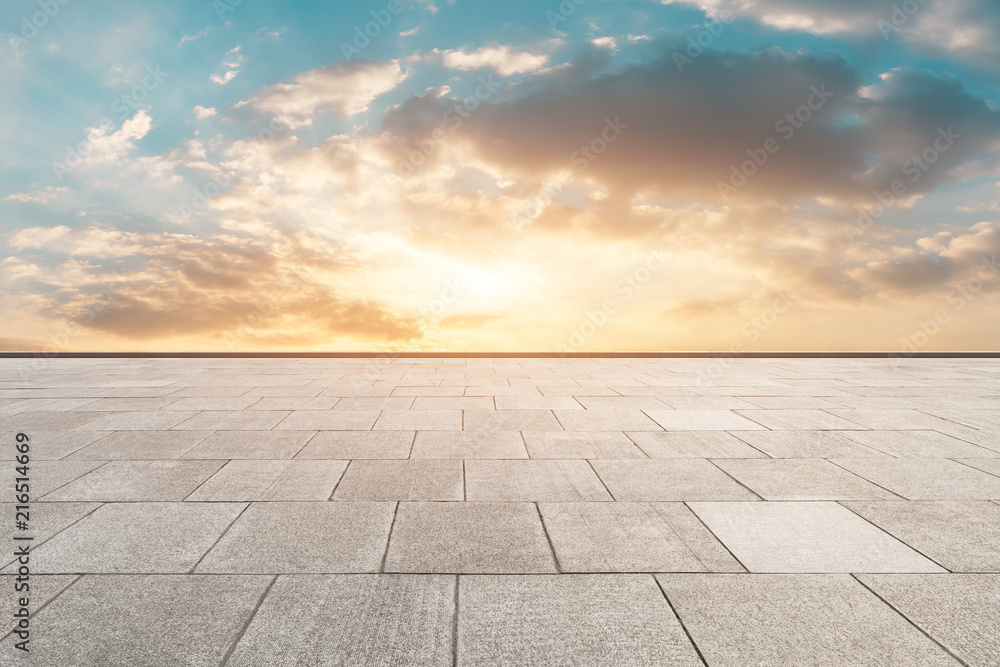 Clean square floor and beautiful colorful sky clouds at sunrise