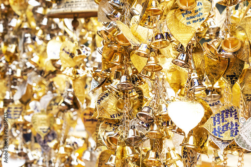 A small number of gold and silver bells were hung for blessings measured in faith. © adisorn123