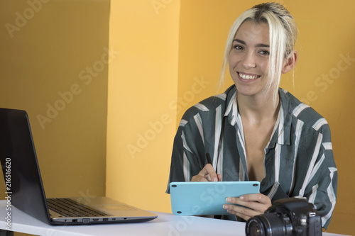 Executive working with multiple devices photo