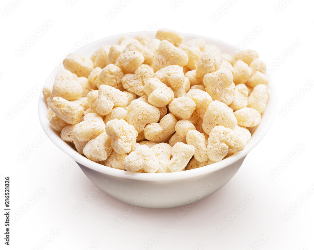 Corn hearts in bowl isolated on white Corn hearts in bowl isolated on white