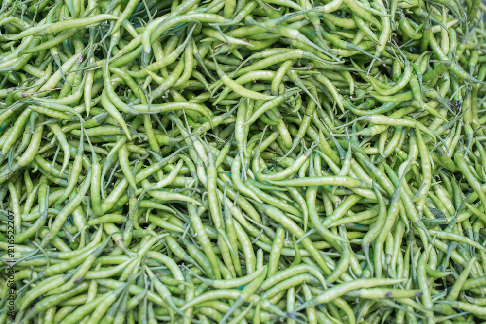 A huge pile of green chilly fruits A huge pile of green chilly fruits